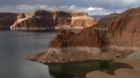 Flying over layered rock formation in Lake Powell Stock Footage 59526095
