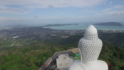 Flying over left shoulder of Big Buddha Phuket, distance view Stock Footage 83585653