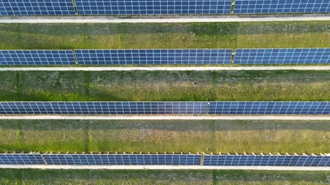 Flying over lines of solar panels Video stock 237411780