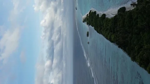 Flying over Long Beach sandbank on Dhigurah Island towards Lux south Ari 動画素材 242595155