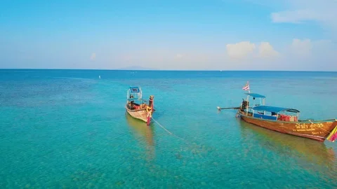 Flying over longtail boats to open sea on Laem Tong, Part Of Phi Phi Island. Stock Footage 93118907