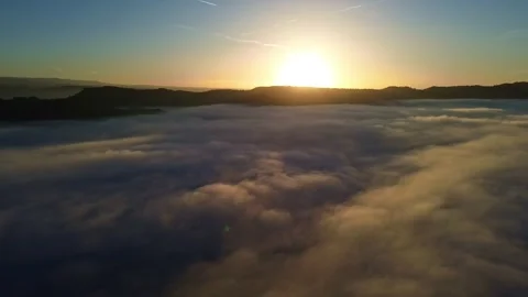 Flying over Low Hanging Clouds at Sunset 4k Drone Stock-Footage 294097738