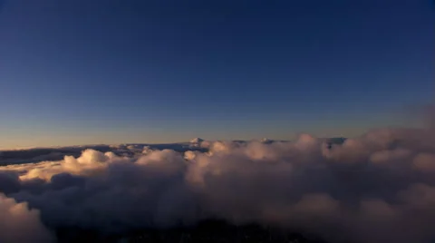 Flying over lumpy clouds, tilting left Stock Footage 59430629