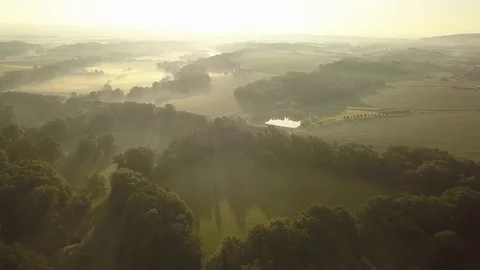 Flying over the magnificent sunrise over the beautiful landscape Stock Footage 77112486