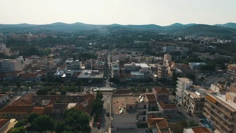 Flying over main street in small town of southern Europe at sunset. Stock Footage 86963366