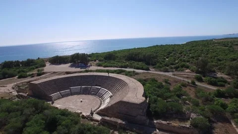 Flying over a man walking on top of Amphitheater at Salamis. Cyprus. DJI-0238-04 Stockbeeldmateriaal 137147855