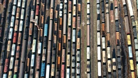Flying over many colored train cars Stock-Footage 105290880