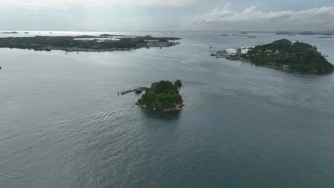 Flying over Mariam Island viewing to Sambu and Belakang Padang Stock Footage 251254322
