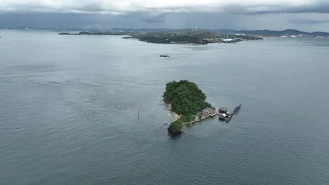 Flying over Mariam Island viewing to Tanjung Pinggir Stock Footage 251254406