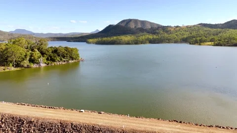 Flying over the Maroon Dam wall in Australia Stock Footage 346254931