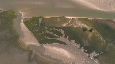 Flying over the Marsh and Ocean Stock Footage 79080236