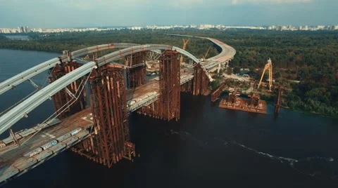 Flying Over Massive Bridge in Under Construction Stock Footage 68721592
