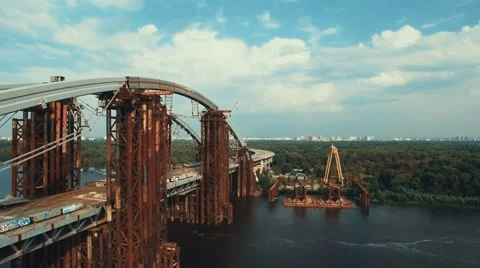 Flying Over Massive Bridge in Under Construction Stock Footage 68721610