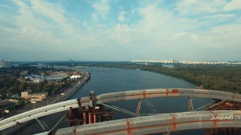 Flying Over Massive Bridge in Under Construction Stock Footage 68721753