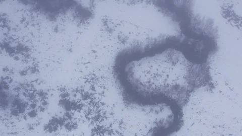 Flying Over a Meandering River Through the Mist in Winter Stock-Footage 324821063