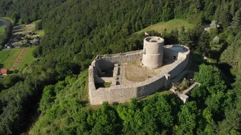 Flying over medieval castle and view of Poprad river in summer Stock Footage 140914189