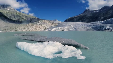Flying over melting ice floe on glacier lake. climate change background Stock Footage 42247128