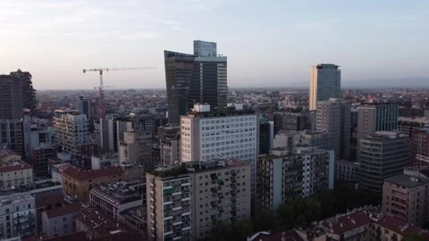 Flying over Milan at sunset in the Central Station area Stock-Footage 252934456