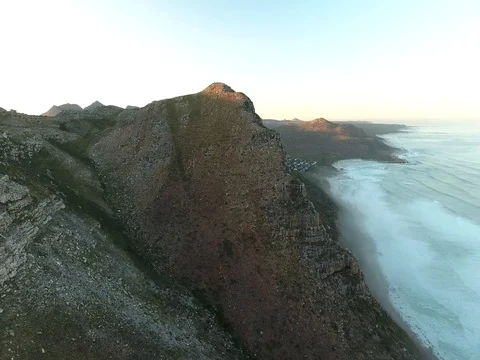 Flying over misty beach at dawn at sunrise 스톡 동영상 79925741