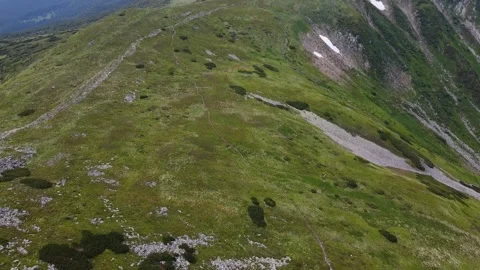 Flying Over Misty Mountain Landscape in Summer Stock Footage 339660189