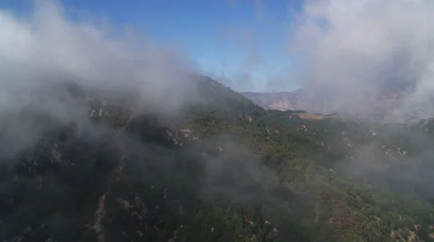Flying over a misty ridge in Angeles National Forest in the San Gabriel Stock Footage 59114017