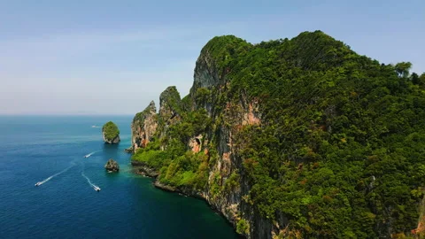 Flying over Mount Phi Phi from the sea Stock Footage 232231352