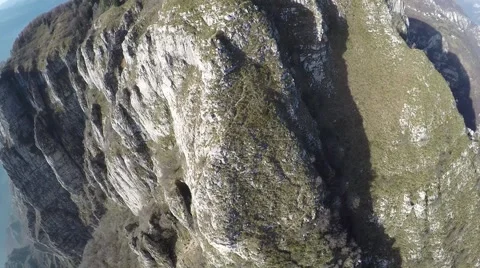 Flying over mountain. Aerial view of mountain peaks Video stock 44322574