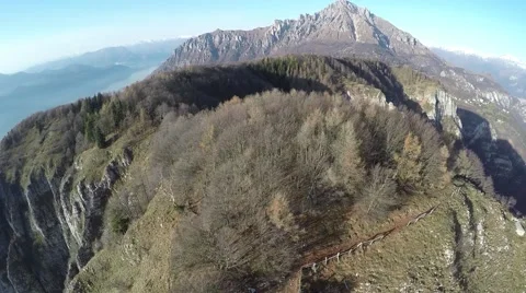 Flying over mountain. Aerial view of mountain peaks Video stock 44322648