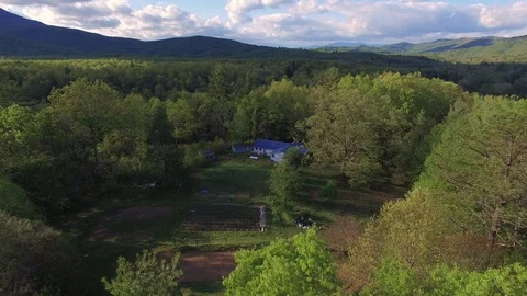 Flying Over a Mountain Cabin #1 Stockbeeldmateriaal 128538909