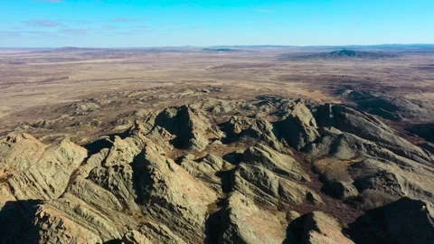 Flying over mountain formations in the steppe of Kazakhstan. Stock Footage 327672392
