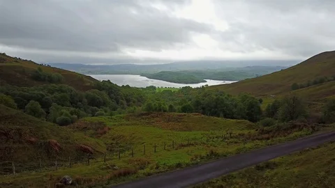 Flying over the mountain gorge between Ardchattan and Barcaldine surrounded by Stock Footage