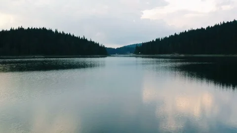 Flying over mountain lake Stock Footage 93281763