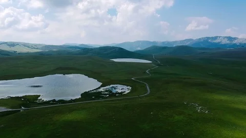 Flying over mountain lakes Stock Footage 93281771