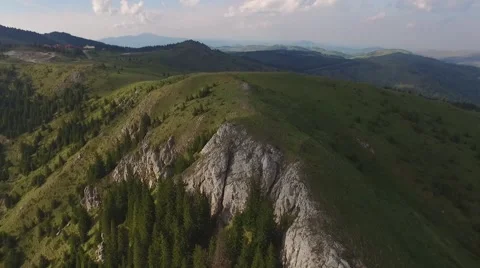 Flying over the mountain peak Stock Footage 63506937