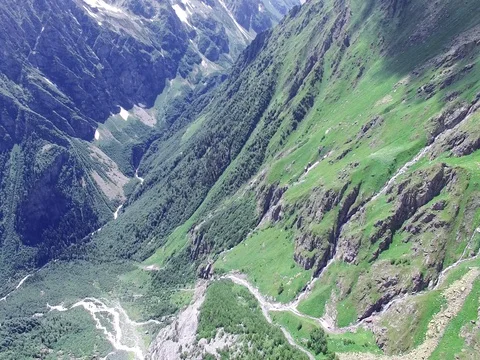 Flying over mountain range valley Aerial 4k video. Hiking Travel Tourism Stock Footage 80314553