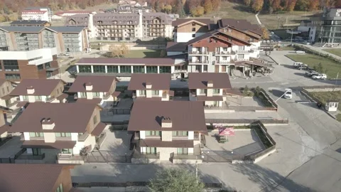 Flying over mountain resort Crystal in Bakuriani. Modern hotel in mountains. Видео 142864859