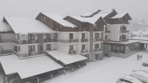 Flying over mountain resort Crystal in Bakuriani. Snowy winter day. Stock Footage 150584437