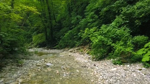 Flying over a mountain river Beautiful views of the water in the mountain canyon Stock Footage 113651843