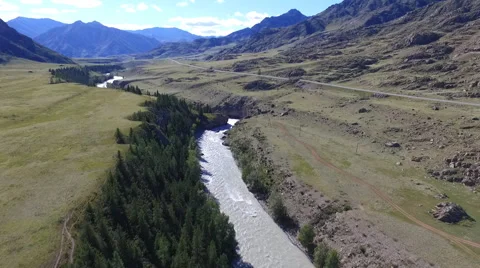 Flying over the mountain river in the mountains 스톡 동영상 67835365