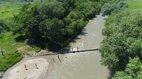 Flying over a mountain river, a strong stream of water. From the air Video stock 86266808