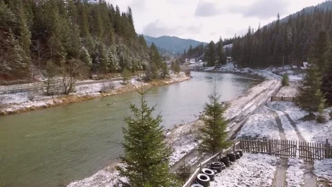 Flying Over A Mountain River In The Winter Stock Footage 143636071