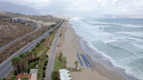 Flying over the mountain road and sea coastline at summer day in Crete.  Stock Footage 168254170