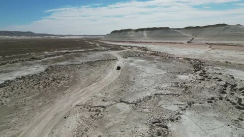Flying over a mountain road in a mountain desert Stock Footage 237694380
