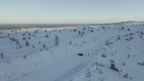 Flying Over Mountain Top In Levi During Sunrise In Winter Stock Footage 222992777