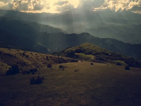 Flying over mountains and forest Stock Footage 75311633