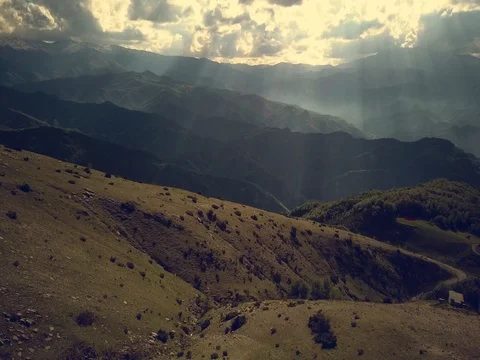 Flying over mountains and forest Stock Footage 75311669
