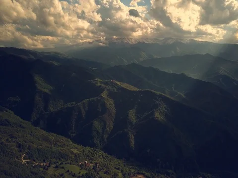 Flying over mountains and forest Stock Footage 75311710