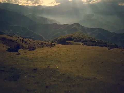 Flying over mountains and forest Stock Footage 75311788