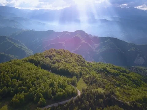 Flying over mountains and forest Stock Footage 75314637