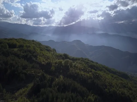 Flying over mountains and forest Stock Footage 75314740